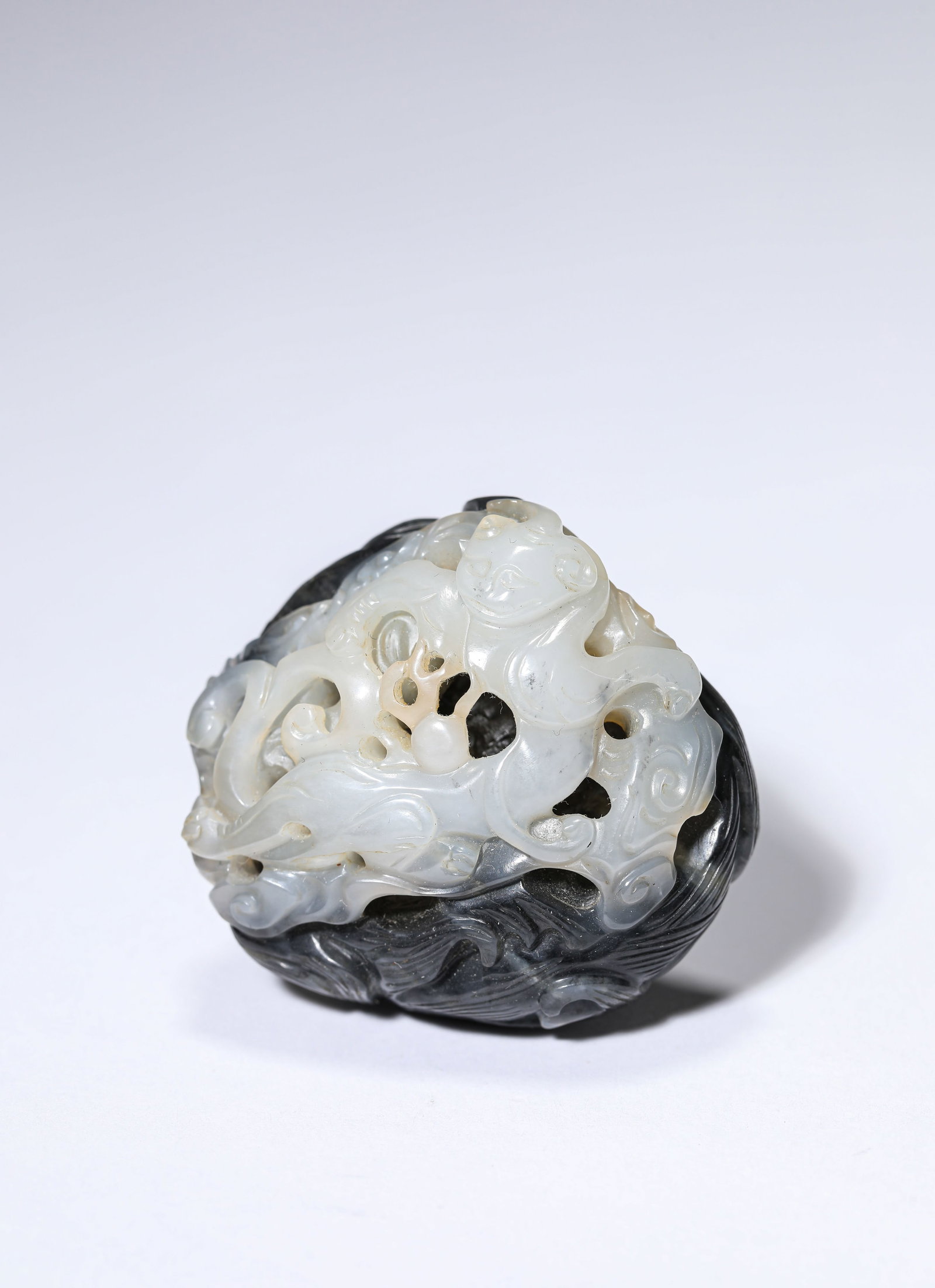 A JADE 'CHI-DRAGON' ORNAMENT: A JADE 'CHI-DRAGON' ORNAMENT Dimensions: Length: 4.2 cm (1.65 in) x Width: 2.2 cm (0.87 in) x Height: 4.1 cm (1.61 in). All measurements are approximate.