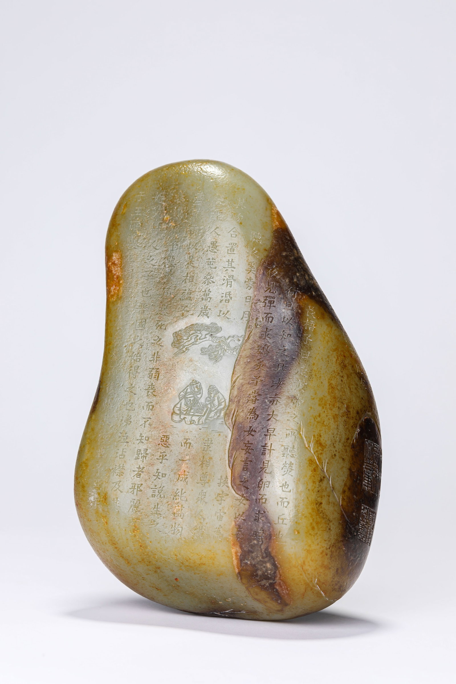 A JADE 'POETIC INSCRIPTION AND MOUNTAIN' ORNAMENT: A JADE 'POETIC INSCRIPTION AND MOUNTAIN' ORNAMENT Dimensions: Length: 14.3 cm (5.63 in) x Width: 8.0 cm (3.15 in) x Height: 21.9 cm (8.62 in). All measurements are approximate.