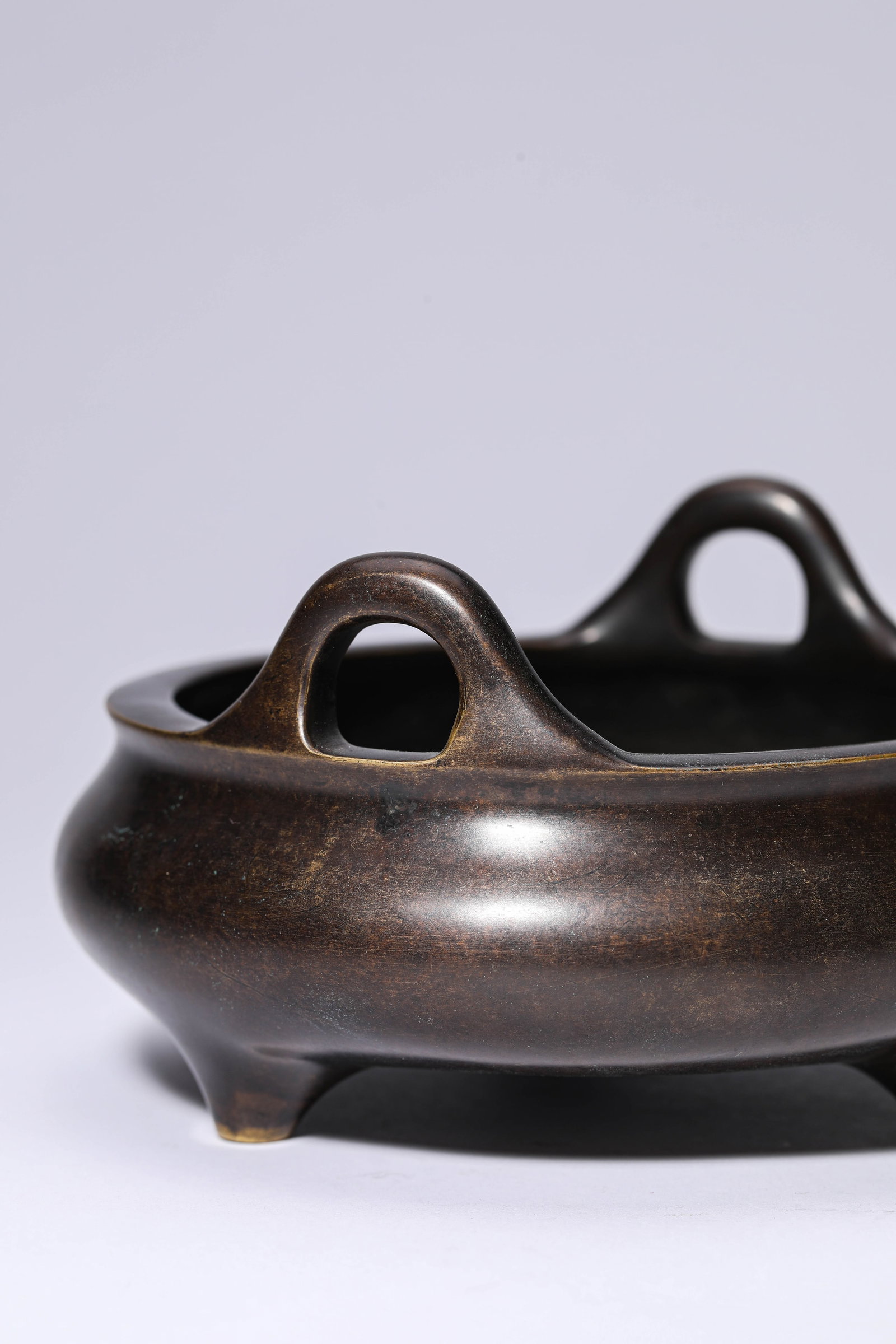 A BRONZE 'UPRIGHT-HANDLED' CENSER - 2