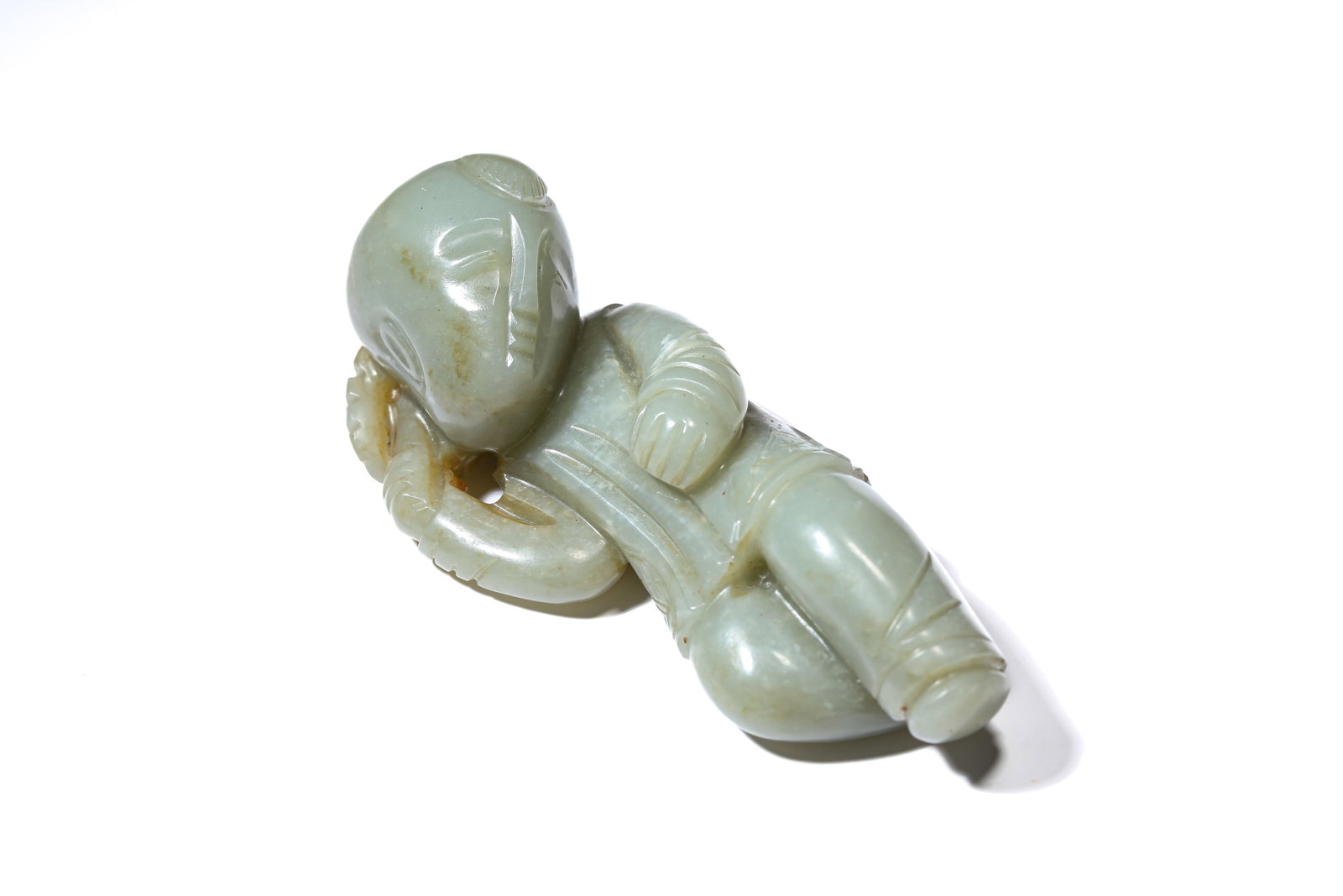 A JADE FIGURE OF A BOY: A JADE FIGURE OF A BOY Dimensions: Length: 4.8 cm (1.89 in) x Width: 4.1 cm (1.61 in) x Height: 11.1 cm (4.37 in). All measurements are approximate.