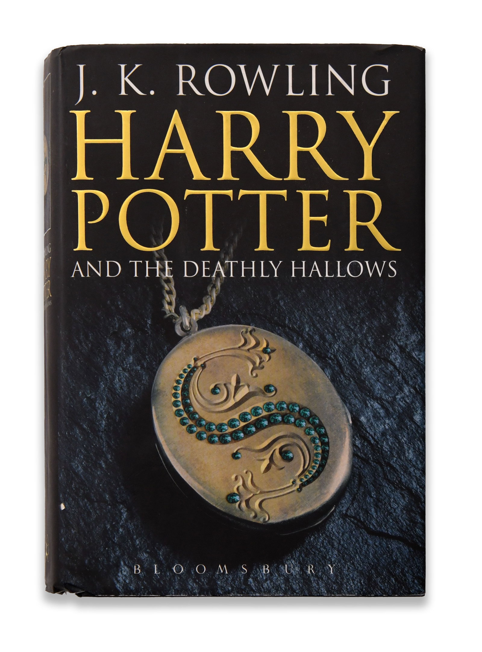 J.K. ROWLING SIGNED HARRY POTTER AND THE DEATHLY HALLOWS BOOK: J.K. ROWLING SIGNED HARRY POTTER AND THE DEATHLY HALLOWS BOOK Provenance and Authenticity: The supplied photographs for J.K. Rowling signed Harry Potter and the Deathly Hallows book record more than t