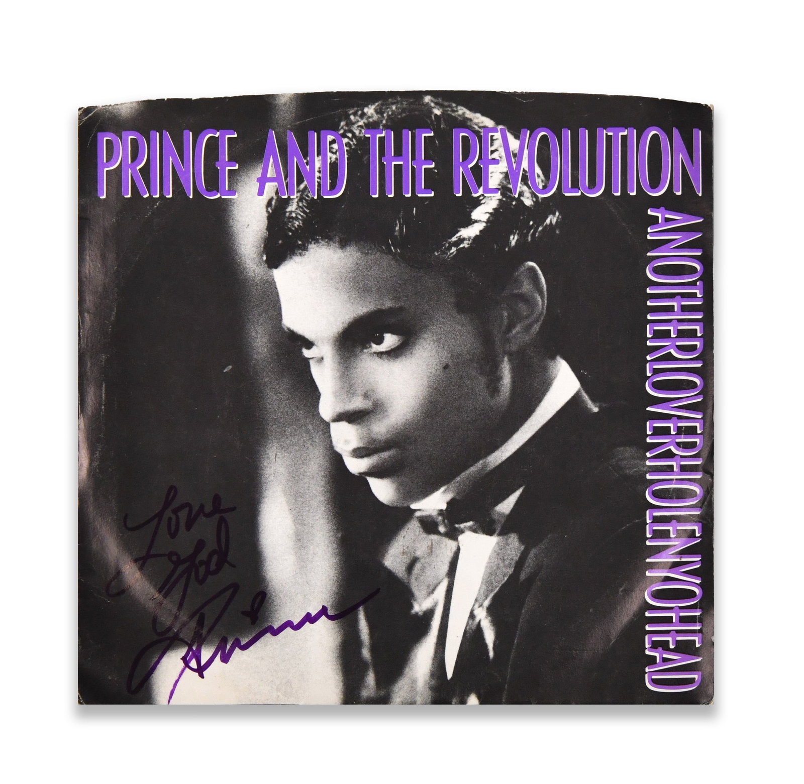 PRINCE - SIGNED "ANOTHERLOVERHOLENYOHEAD" 7-INCH SINGLE (PRINCE AND THE REVOLUTION, 1986): PRINCE - SIGNED "ANOTHERLOVERHOLENYOHEAD" 7-INCH SINGLE (PRINCE AND THE REVOLUTION, 1986) Provenance and Authenticity: The sleeve is signed in bold marker by Prince, positioned across the lower left