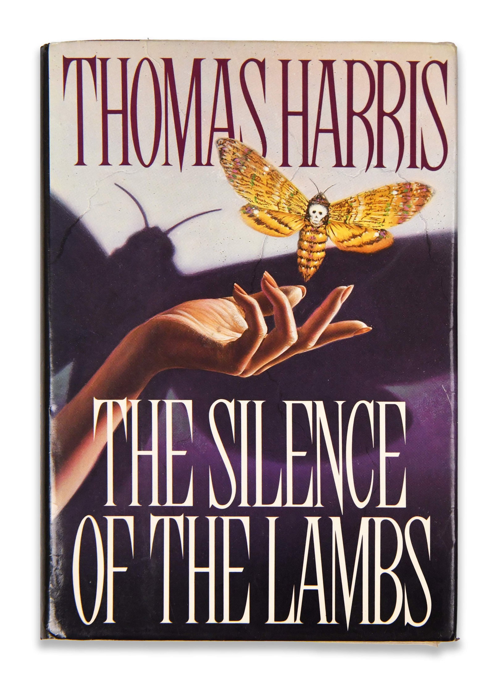THOMAS HARRIS - SIGNED THE SILENCE OF THE LAMBS: THOMAS HARRIS - SIGNED THE SILENCE OF THE LAMBS Provenance and Authenticity: The title page bears a clear blue ink signature reading "Thomas Harris," positioned beneath the printed title and executed 