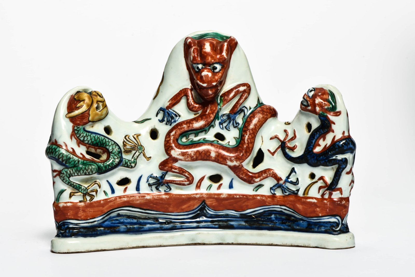 A WUCAI 'DRAGON' MOUNTAIN-SHAPED BRUSH REST (1 of 4)