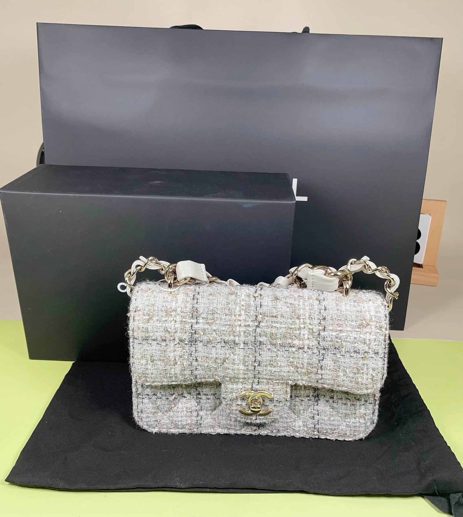 CHANEL CLASSIC FLAP LARGE MINI TWEED BAG: CHANEL CLASSIC FLAP LARGE MINI TWEED BAG CHANEL, Classic Flap, Large Mini. A tweed flap bag with a signature Double C turn-lock closure. A microchip-era example, presented in excellent condition, appr