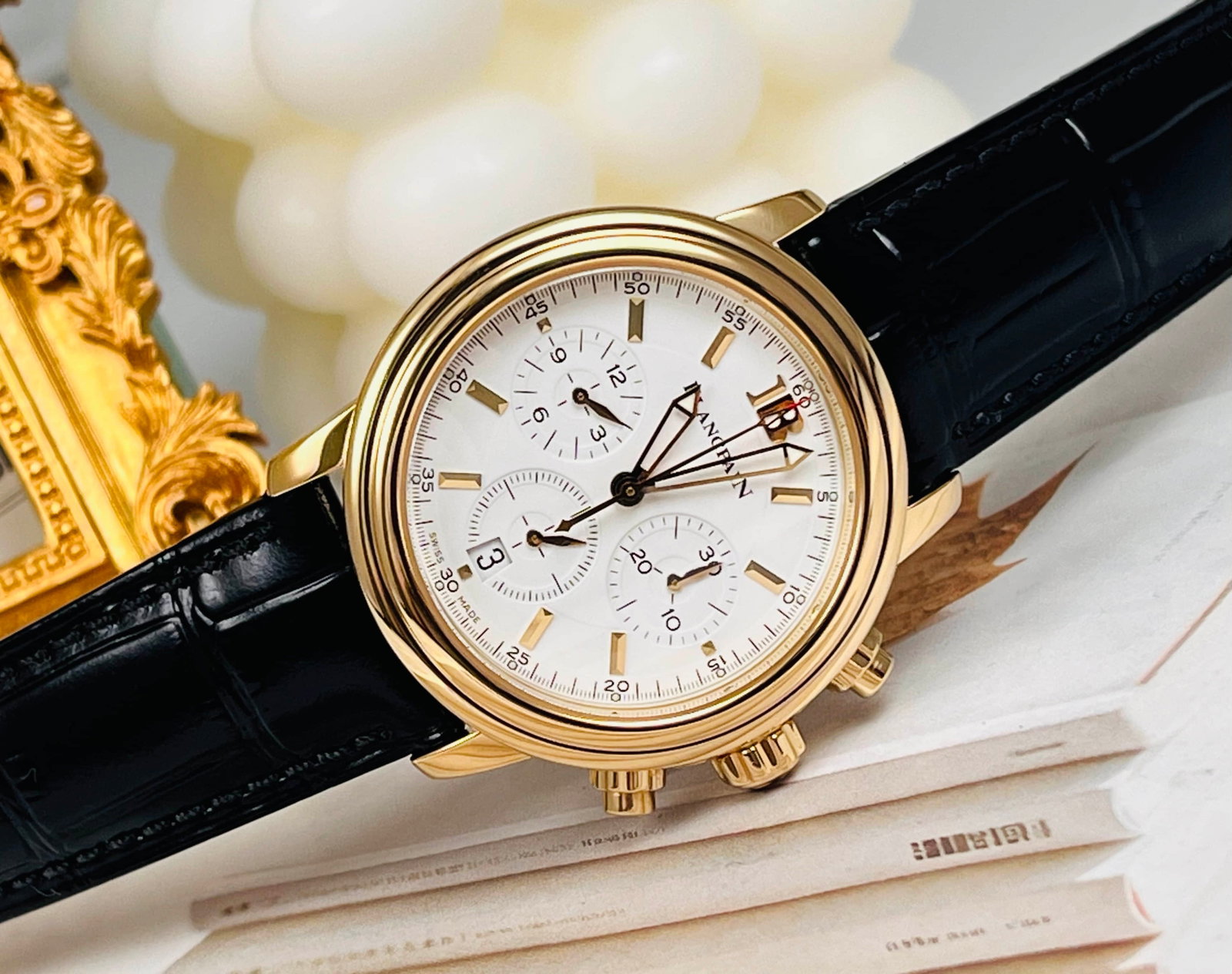 BLANCPAIN 18K YELLOW-GOLD AUTOMATIC CHRONOGRAPH WRISTWATCH: BLANCPAIN 18K YELLOW-GOLD AUTOMATIC CHRONOGRAPH WRISTWATCH BLANCPAIN. An automatic chronograph wristwatch with a 38.5 mm 18K yellow-gold case. Featuring a white dial with applied gold hour markers,