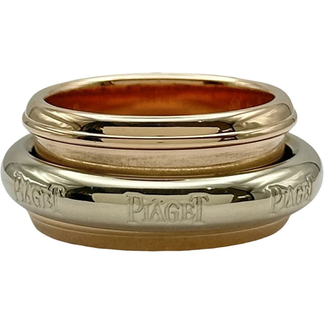 PIAGET POSSESSION TWO-TONE GOLD INTERLOCKING BAND RINGS (20TH CENTURY) (1 of 2)