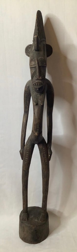Carved Wooden Senufo Statue Origin: Private estate Material: Wood Measures: 34"tall Condition: Very (1 of 14)