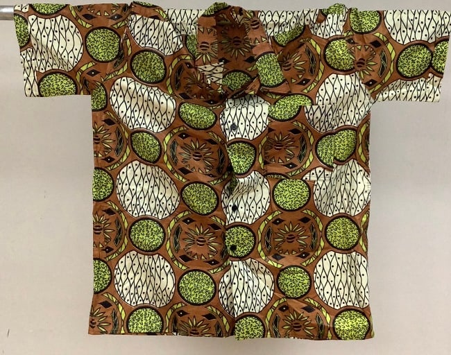 African Print Shirt & Shot Set Origin: Private estate Material: Cloth, cotton/cotton blend Measures:: Origin: Private estate Material: Cloth, cotton/cotton blend Measures: Shirt, 30"L, elastic waist shorts, 9"inseam Condition: Very good handmade condition