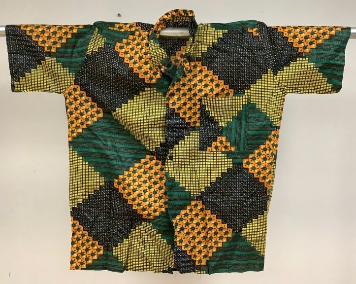 Diamond Shapes African Print Shirt & Shorts Origin: Private estate Material: Cloth, cotton/cotton: Origin: Private estate Material: Cloth, cotton/cotton blend Measures: Shirt, 29"L, elastic waist shorts, 10"inseam. Condition: Very good handmade condition