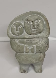 Annie Niviaxie Mother With Child Stone Sculpture TYPE: Inuit Stone Sculpture: TYPE: Inuit Stone Sculpture MATERIAL: Stone DIMENSIONS: 7.5" tall ARTIST: Annie Niviaxie