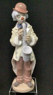 Lladro Sad Sax Clown Payaso PROVENANCE: Private: PROVENANCE: Private estateMATERIAL: PorcelainDIMENSION: 9"tallCONDITION: Very good.