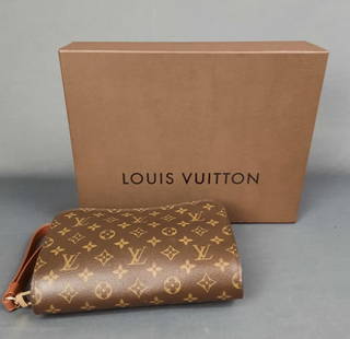 Louis Vuitton Monogram Orsay Canvas Clutch with Dust Bag and Box: Dust Bag and Box Brand: Louis Vuitton Style: Clutch Color: Brown Material: Leather/monogram canvas Additional information: Measures 10" X 2" X 6" tall. There is a scratch on the bottom of the bag. Cre