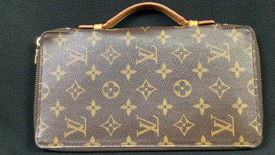 Louis Vuitton Monogram Wallet MANUFACTURER: Louis Vuitton MATERIAL: Leather DIMENSIONS: 10": MANUFACTURER: Louis VuittonMATERIAL: Leather DIMENSIONS: 10"