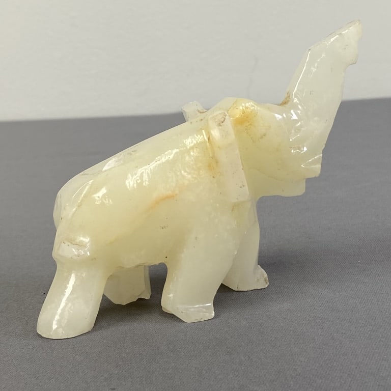 Green Onyx Carved Elephant Small elephant carved of green onyx, elephant is light green, almost (1 of 6)
