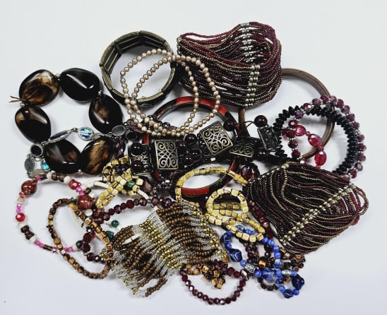 Costume Jewelry Bracelet Grab Bag A collection of various bracelets, showcasing a diverse range of (1 of 6)
