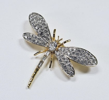 Gold Tone Crystal Dragonfly Brooch This is a gold-tone dragonfly brooch. It is encrusted with clear (1 of 6)