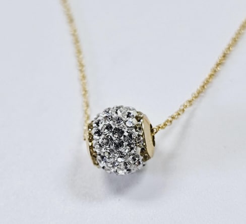 10K Clear Crystal Ball Necklace Necklace measures 18: Necklace measures 18 Inches Chain is 14K Gold Filled Pendant is 10K