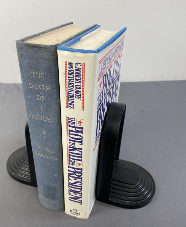 JFK Assassination Books Set of Two The Death of a President by William Manchester, published by: The Death of a President by William Manchester, published by Harper & Row, 1967, first edition. Former library copy with identifying stamps, missing dust jacket. The Plot to Kill the President, Organi
