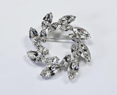 Vintage B Davis Rhinestone Wreath Brooch This is a silver brooch in the shape of a wreath. It is (1 of 8)