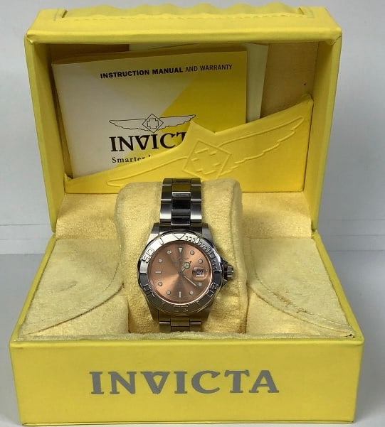 Invicta Quartz Professional Watch #2156 Was running when cataloged: Was running when cataloged Please see images for details regarding condition.