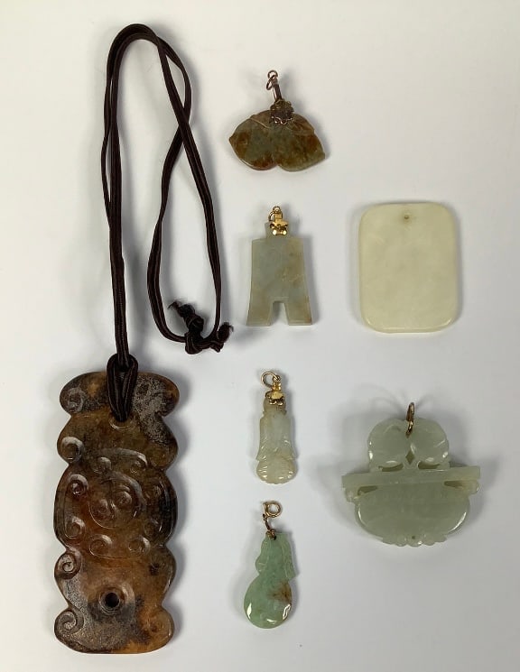 Assorted Jade & Stone Pendants Large piece on rope is stone, other pieces are (1 of 5)