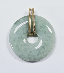 14K Yellow Gold Jade Disc Necklace Pendant Pendant weighs 22.7 Grams