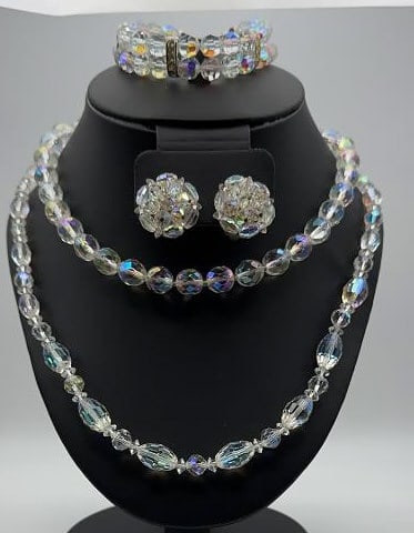 Vintage Iridescent Aurora Borealis Jewelry Set Oval Bead Necklace Measures 25": Oval Bead Necklace Measures 25" Round Bead Necklace Measures 15" Adjustable Bracelet Measures 6”