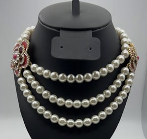 3 Strand Faux Pearl Enamel Flowers Necklace Necklace Measures 19" Necklace is made by Talbots