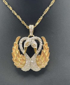 Nolan Miller Double Swan Rhinestone Necklace Necklace Measures 22.5" Necklace is gold tone