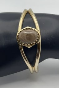 Gold Tone Petoskey Stone Bangle Bracelet Measures 5"  One Prong Missing Around Stone