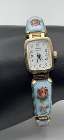 Vintage Chaika Floral Enamel Watch Watch measures 7" Watch is Not Tested