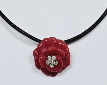 Nolan Miller Gold Tone Coral Lucite Rose Necklace Necklace Measures 17" Leather Cord