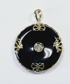 14K Yellow Gold Black Jade Donut Pendant Pendant weighs 4.0 Grams