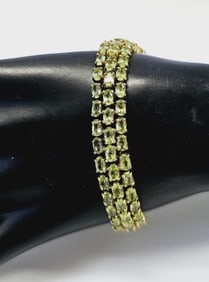 14K Gold over Sterling  Peridot Tennis Bracelet Bracelet weighs 28.8 Grams