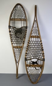 Antique Wood & Rawhide Snow Shoes Wooden snowshoes with rawhide netting and leather straps. Red and