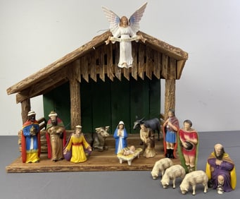 Mid Century Nativity Set with Crèche Fourteen piece hard plastic nativity set with wooden crèche.