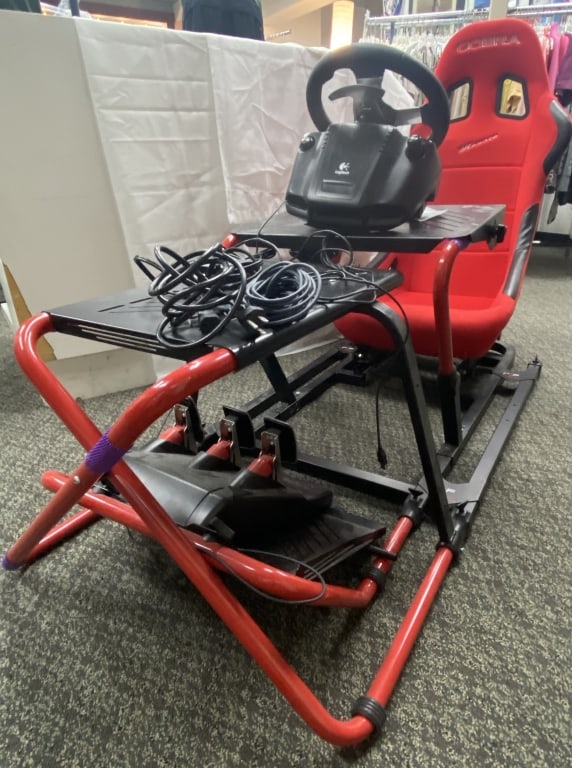 Prova Racing Frame with Logitech Gaming System Prova race frame with Cobra Monaco gaming seat and: Prova race frame with Cobra Monaco gaming seat and Steering Wheel, Pedals, & Gear Stick by Logitech. System is untested and does not include a monitor. Frame is 58 inches long, 22 inches wide, seat is