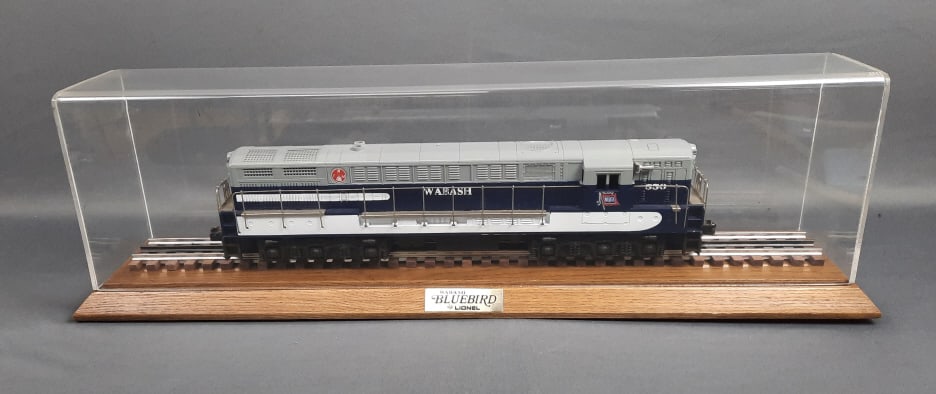 Lionel Wabash Bluebird O Gauge in Display Case is wooden and plastic. Small cracks in plastic of (1 of 14)