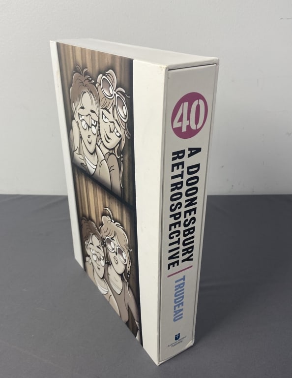 40 Doonesbury Retrospective Comic Strip Book A Doonesbury Retrospective by Gary Trudeau, published: A Doonesbury Retrospective by Gary Trudeau, published by Andrew McMeel Books, 2010. Includes slip cover.