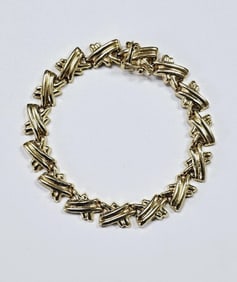 10K Yellow Gold X Hugs Bracelet Bracelet weighs 8.2 Grams