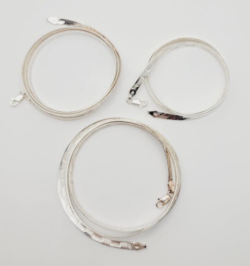 Trio of Assorted Sterling Herringbone Necklaces Necklaces Measure 17", 21", and 24" Consecutively (1 of 6)