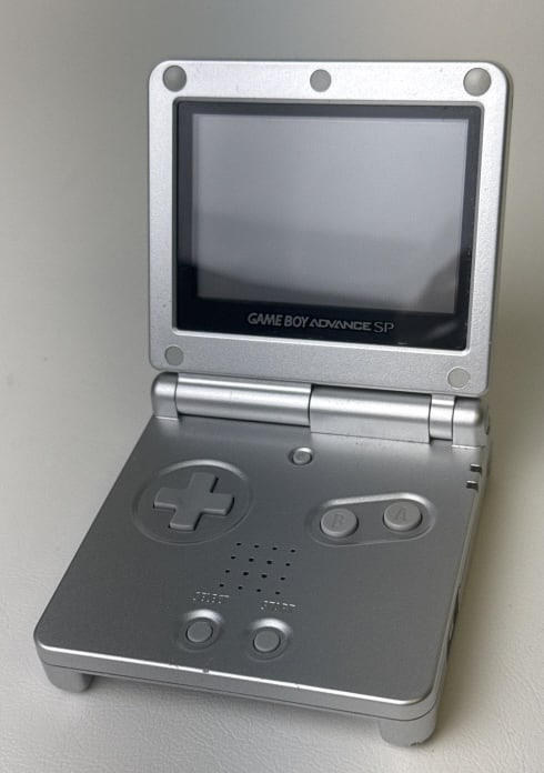 Nintendo Game Boy Advance SP With AC Adapter Game Boy Advance SP works plugged in and not. No Games (1 of 7)
