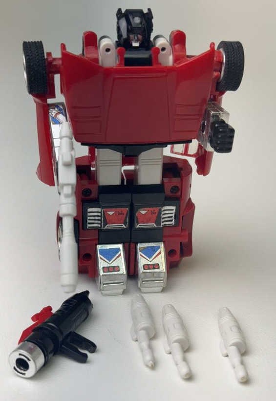 Vintage G1 Transformer Sideswipe Autobot Includes gun, shooter and 3 missiles. Shooter doesn’t: Includes gun, shooter and 3 missiles. Shooter doesn’t work. Heavy play wear. Missing 1 wheel and 1 door window.