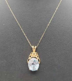 14k Gold Blue Topaz Necklace Necklace Measures 16"  Necklace Weighs 1.8 Grams