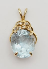14K Gold Blue Topaz and Diamond Accent Pendant Pendant Weighs 3.6 Grams  Metal Not Stamped