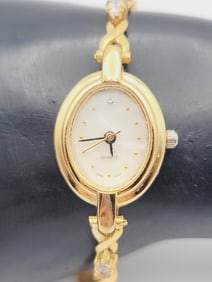 Quartz Mother of Pearl Crystal Watch Watch Measures 7.5"  Watch is Not Tested  Gold Tone Metal