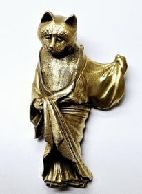 Cat in a Robe Brooch Peabody Essex Museum This graceful cat, disguised as a woman, is adapted from a