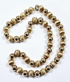 14K Yellow Gold Beaded Necklace Necklace weighs 21.9  Measures 14"