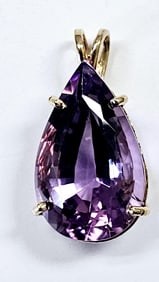 14K Yellow Gold Amethyst Teardrop Pendant Pendant weighs 5.6 Grams
